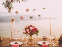 pink-and-red-roses-centerpiece-near-silverwares-1045541